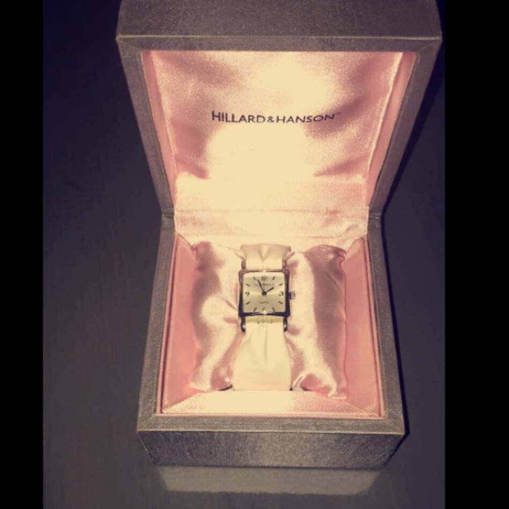 Hillard and Hanson white straped watch