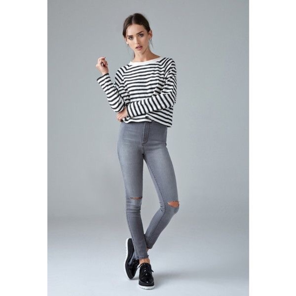 Forever 21 ripped super skinny high rise jeans.