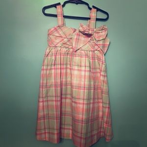 A gingham pink and green dress