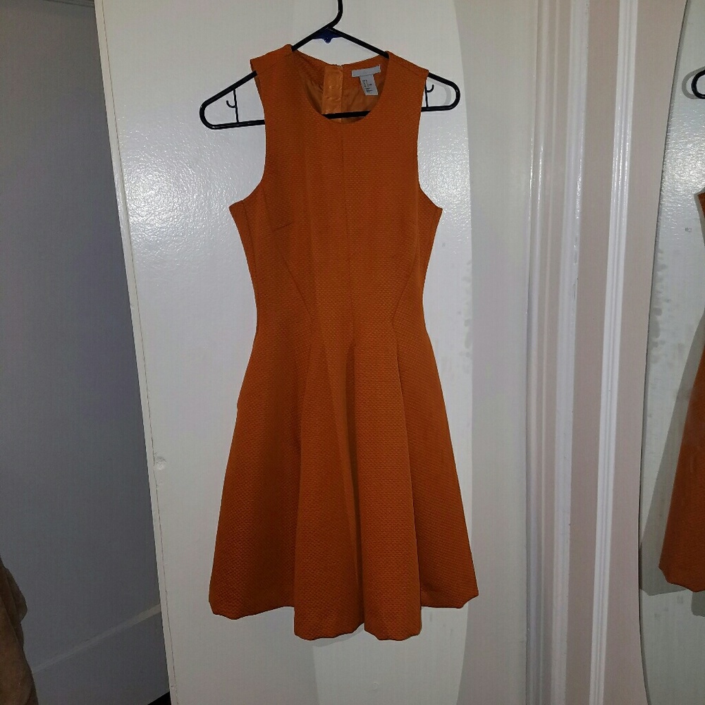 Orange cocktail dress with pockets