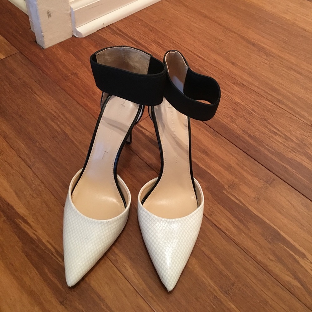 Black and white size six heels
