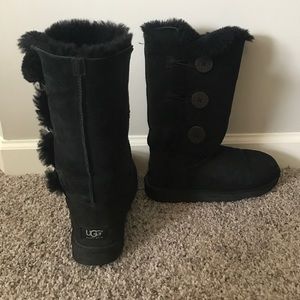 Tall black UGG boots