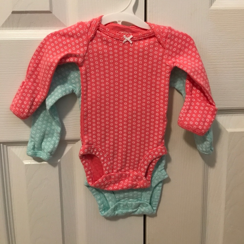 Carters bodysuits. EUC
