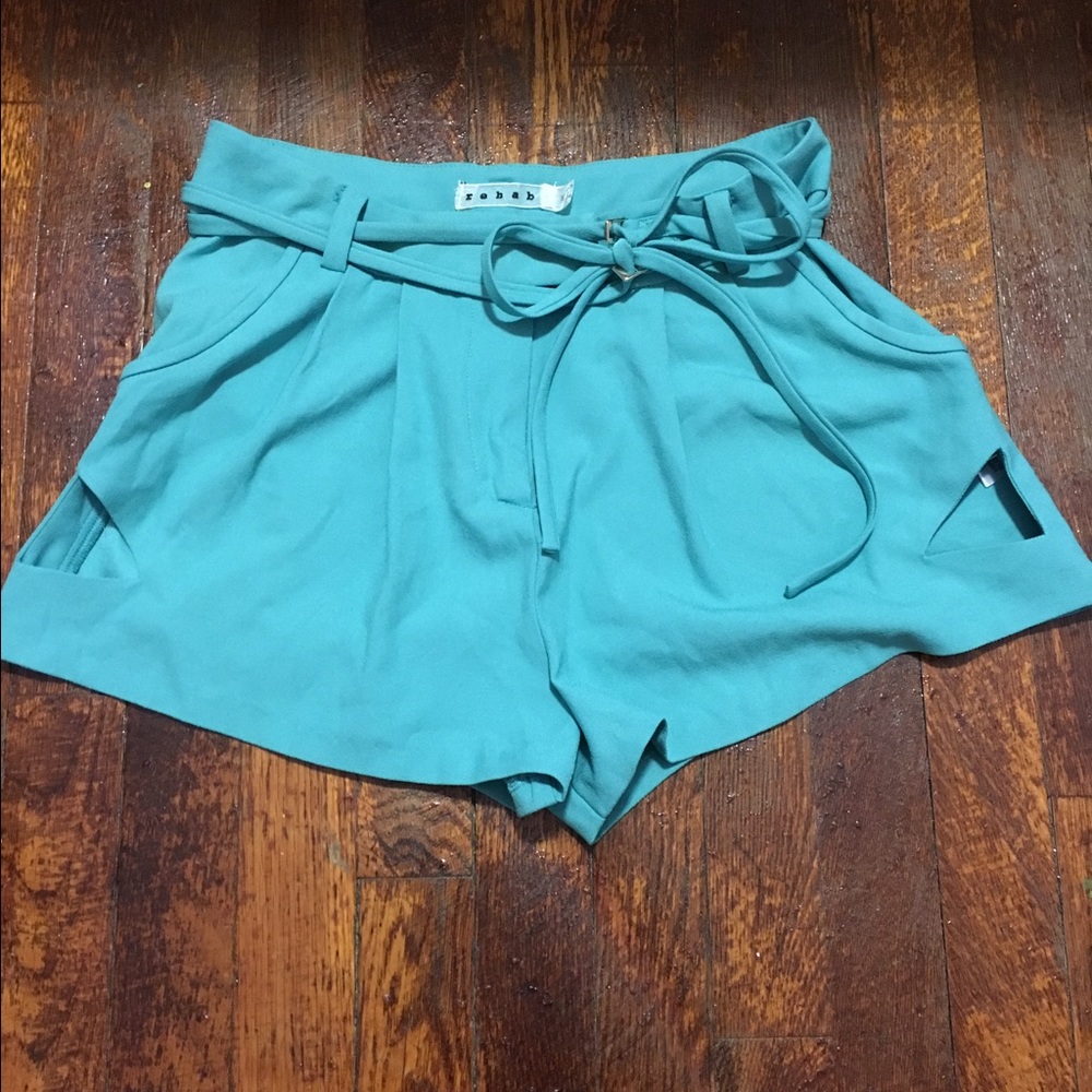 Teal cut-out high waisted shorts