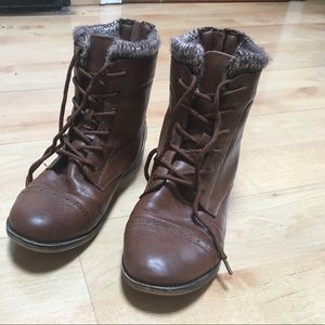Women's combat boots with cozy knot tops.