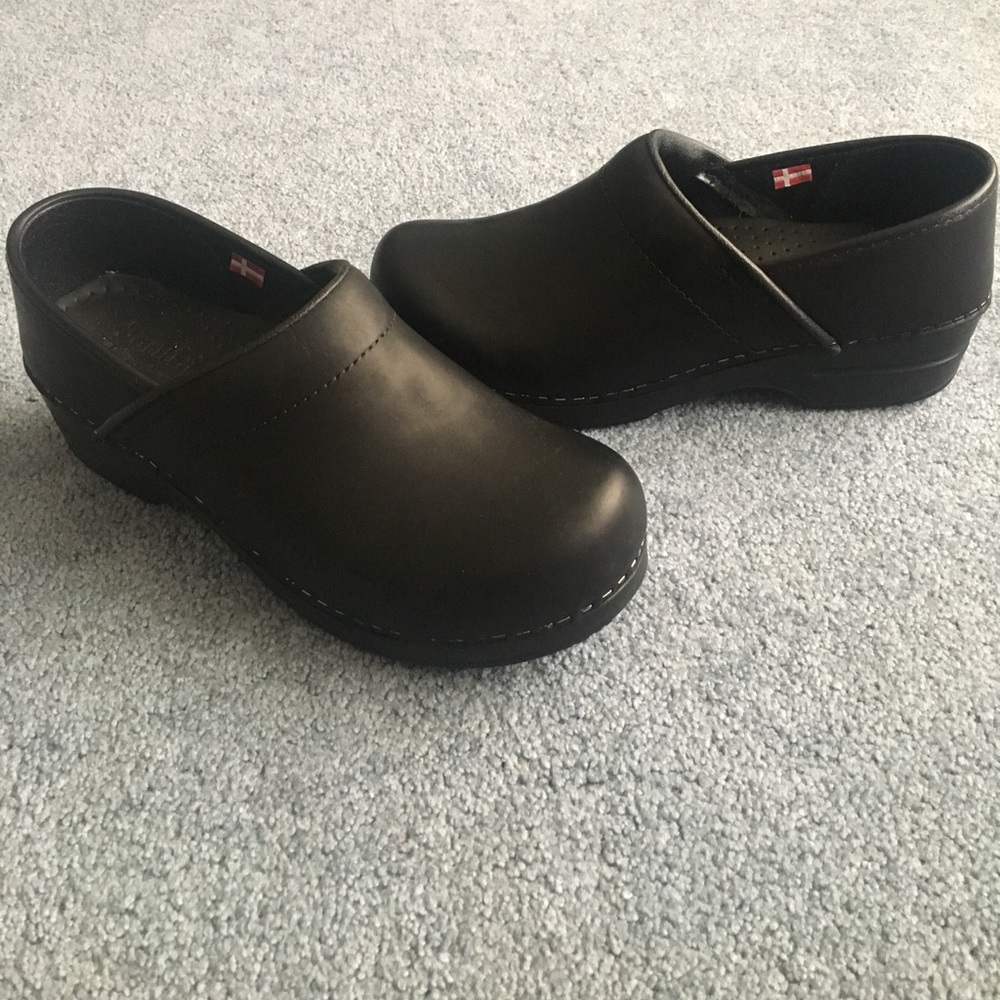 Brand new! Black leather clogs