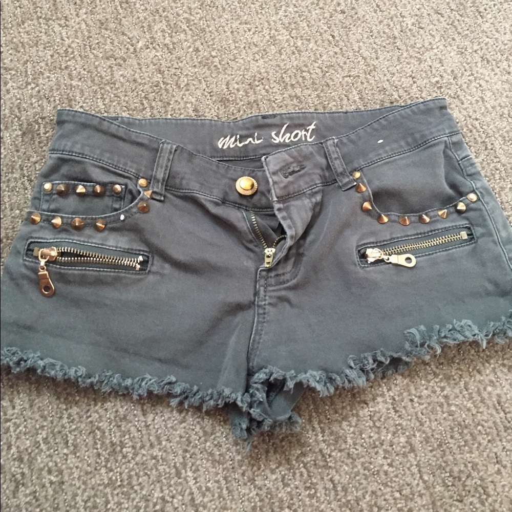 Dark green low waited shorts with gold studs