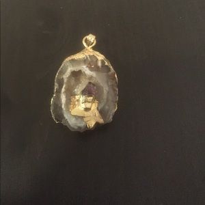 White crystal necklace with purple inside