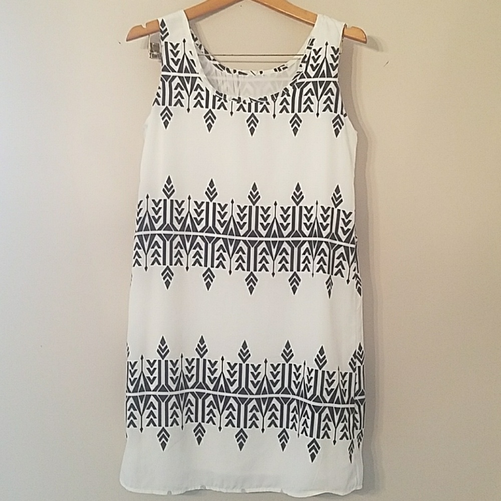 White dress with navy pattern, feels like silk