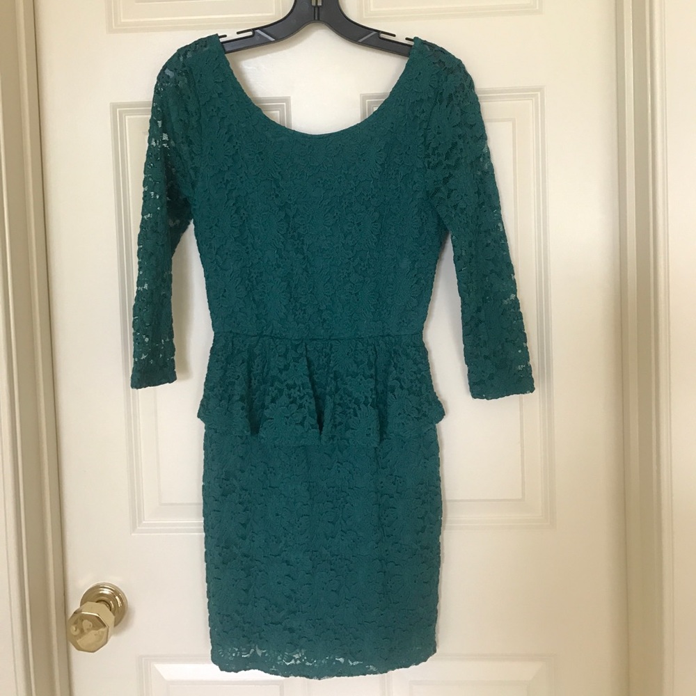 Green peplum dress