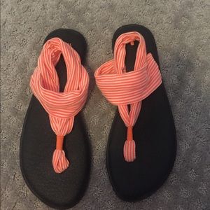 Orange and white striped Sanuk yoga sling sandals