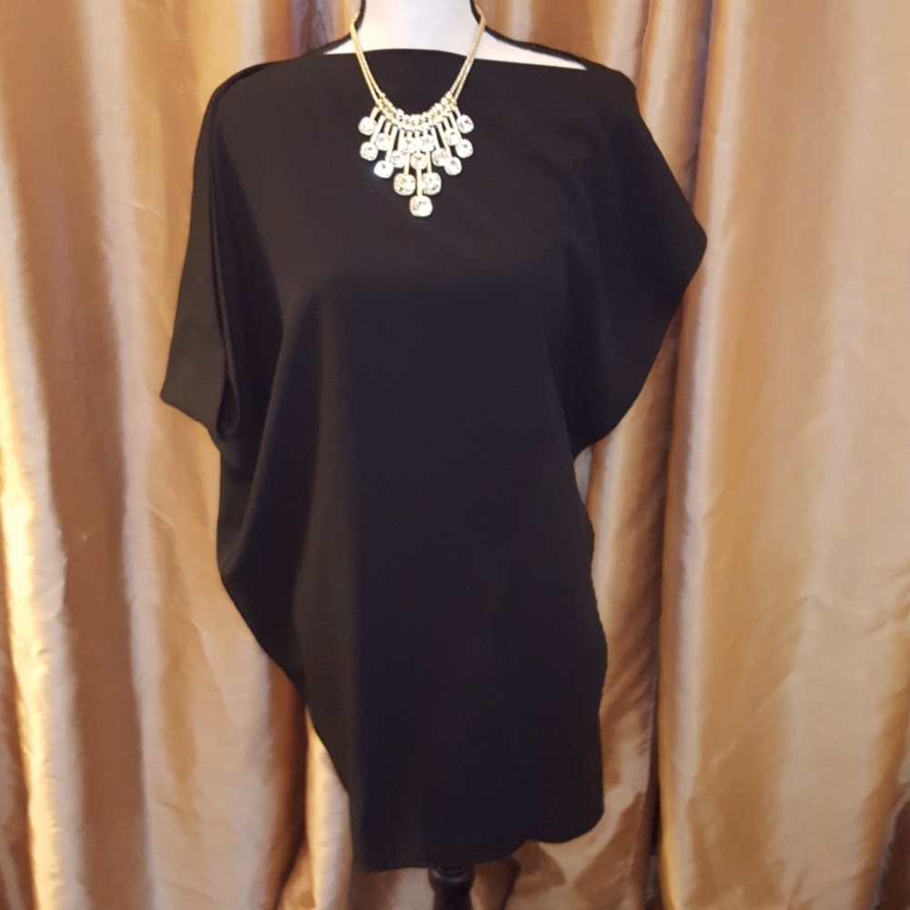 Black asymmetrical detail dress from Nasty Gal