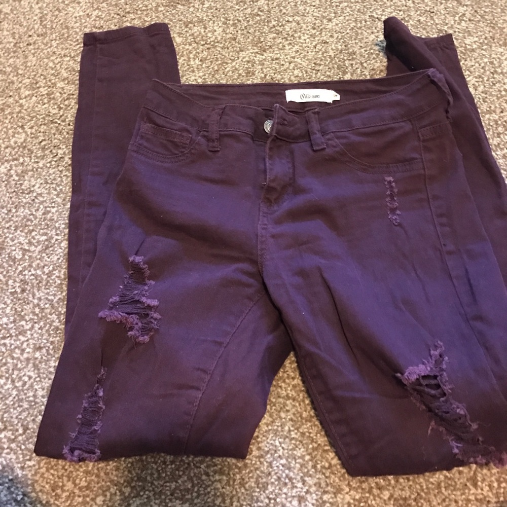 Maroon ripped jeans