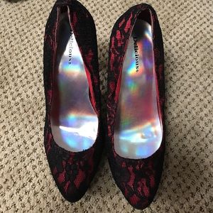 Red and black laced heels