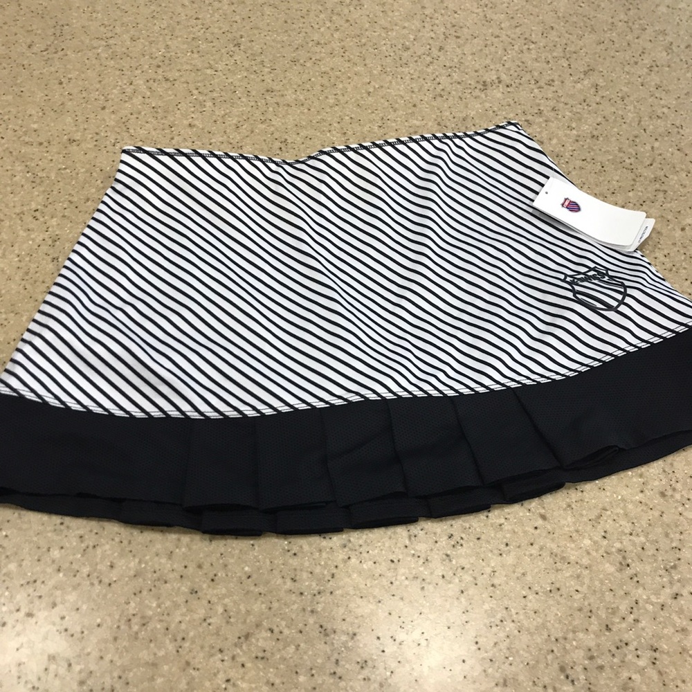 Case with mesh pleated skirt.