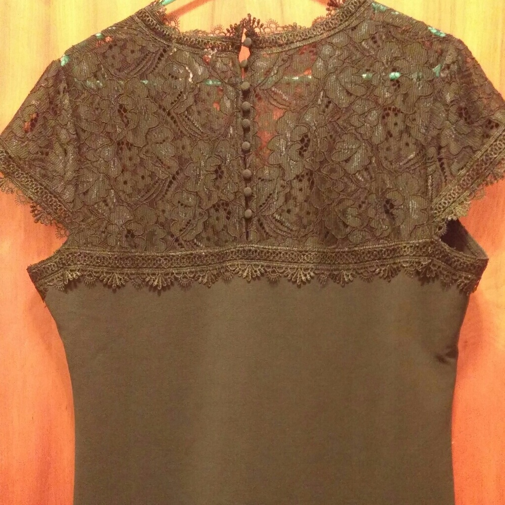 Green lace top shirt.