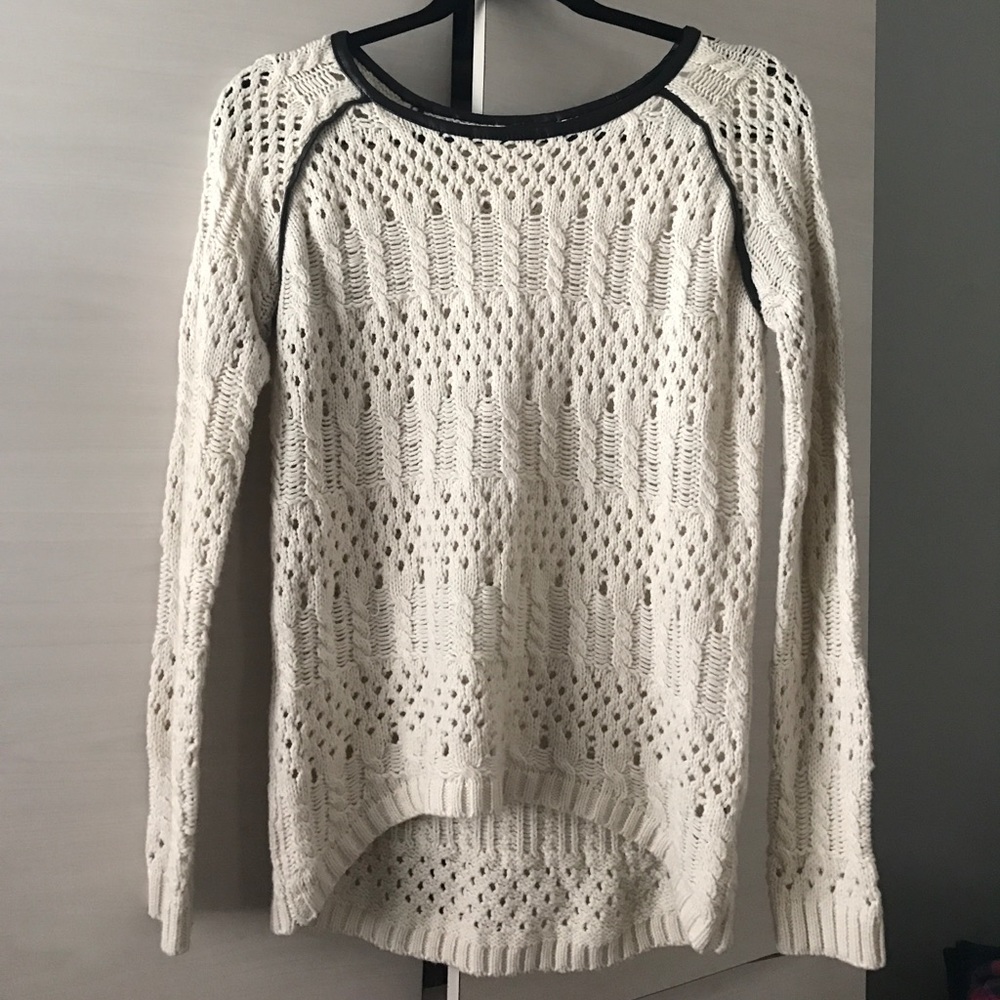 Thick knit sweater with a black leather trim!