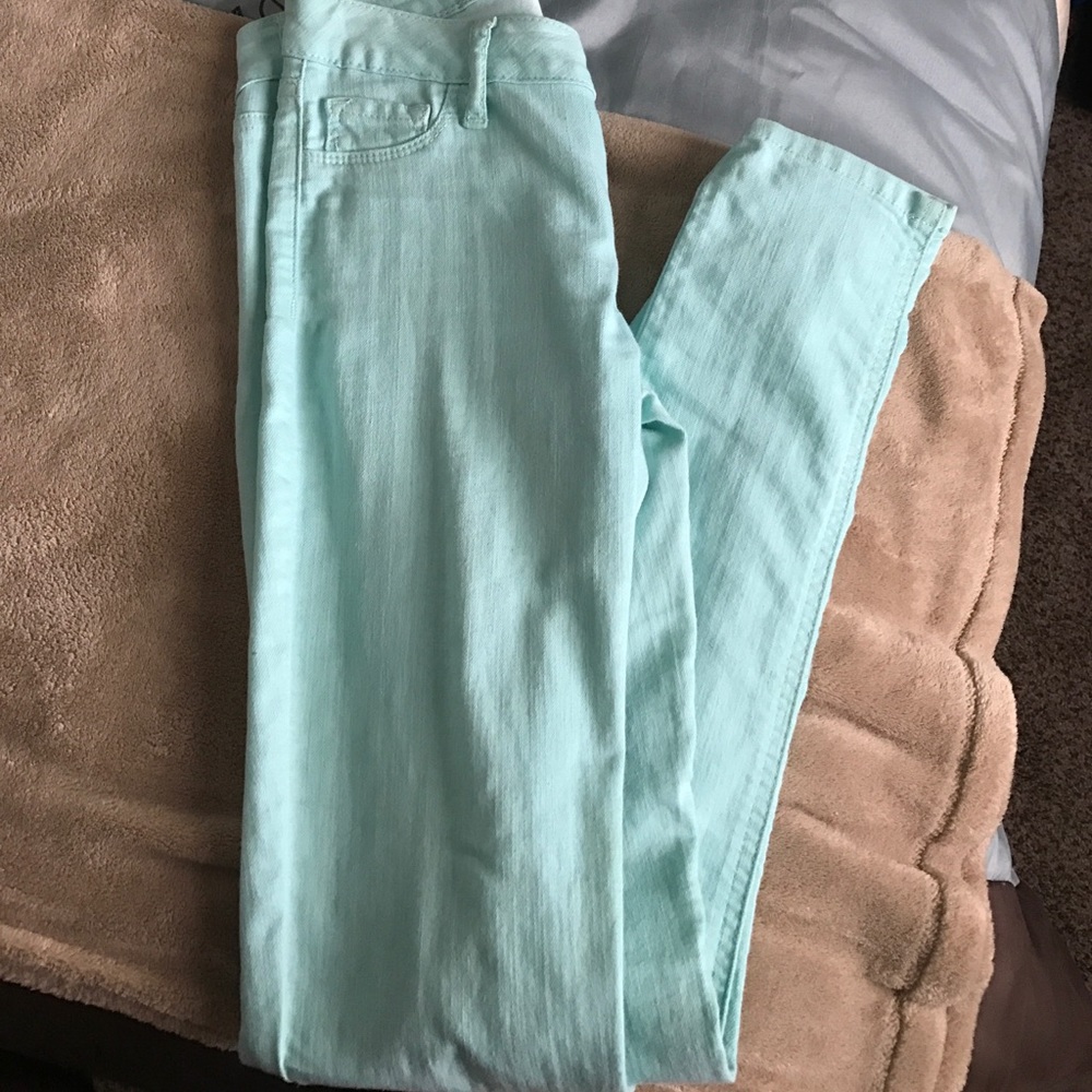 Turquoise skinny jeans