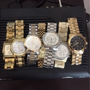 Lot of 7 Michael Kors watches.