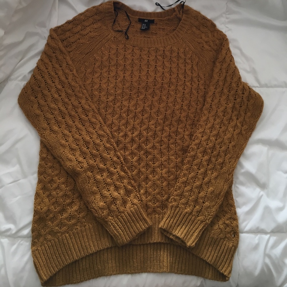 Knit sweater in mustard yellow