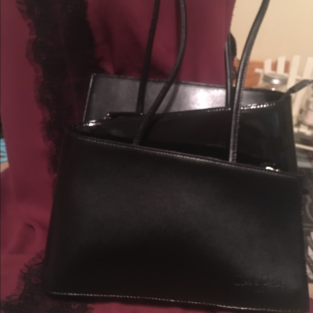 Cleo and Patel black leather handbag