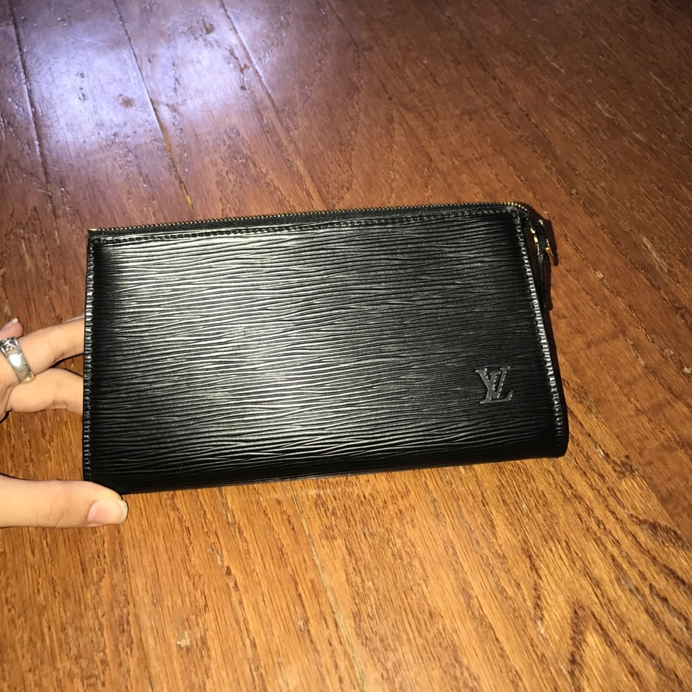 Louis Vuitton leather zippered clutch
