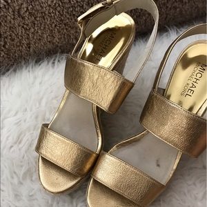 Used Michael kors gold wedge size 8