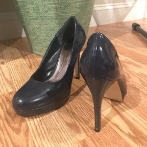 Navy patent heels