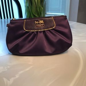 Purple COACH wristlet