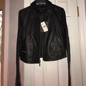BLACK LEATHER JACKET. VERY STYLISH!!