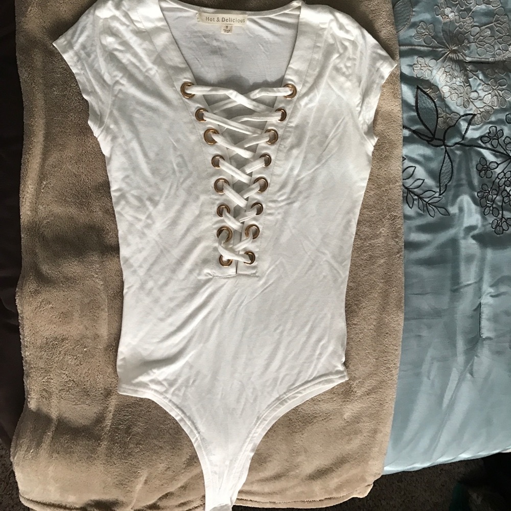 Criss cross front body suit