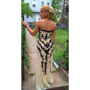 Beige dress with black lacing