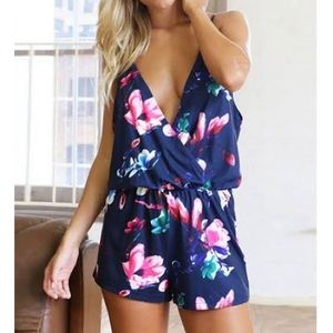 Blue and floral v neck open back romper