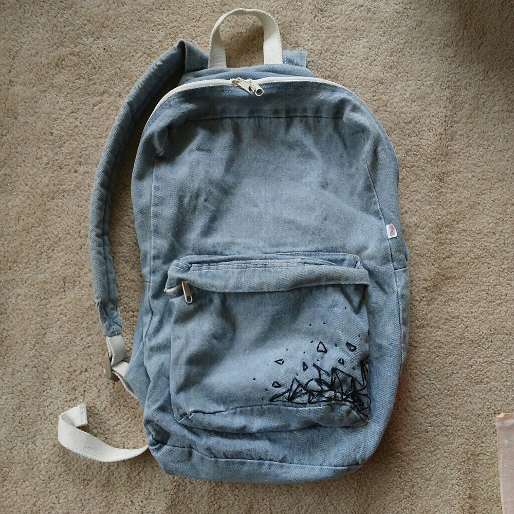 AA light washed denim backpack