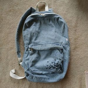 AA light washed denim backpack