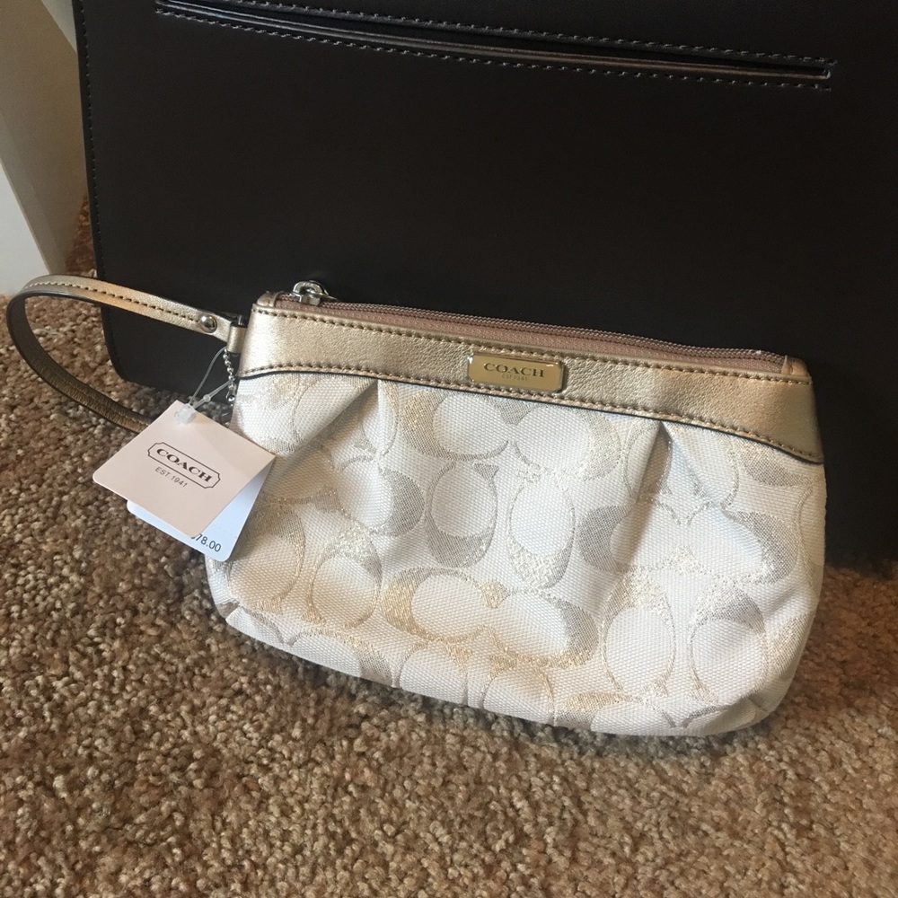 🆕 Coach Wristlet GOLD