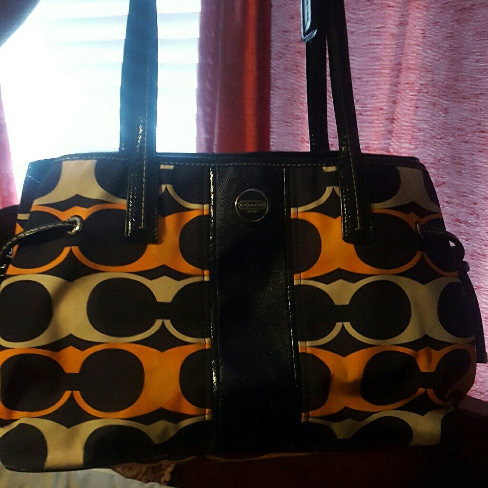 Orange and blue Coach purse