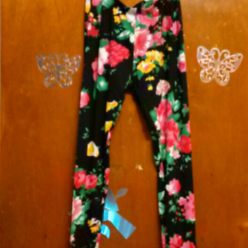 Ladies colorful flower leggings. Size small.