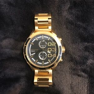 Men's gold diesel watch. In great condition