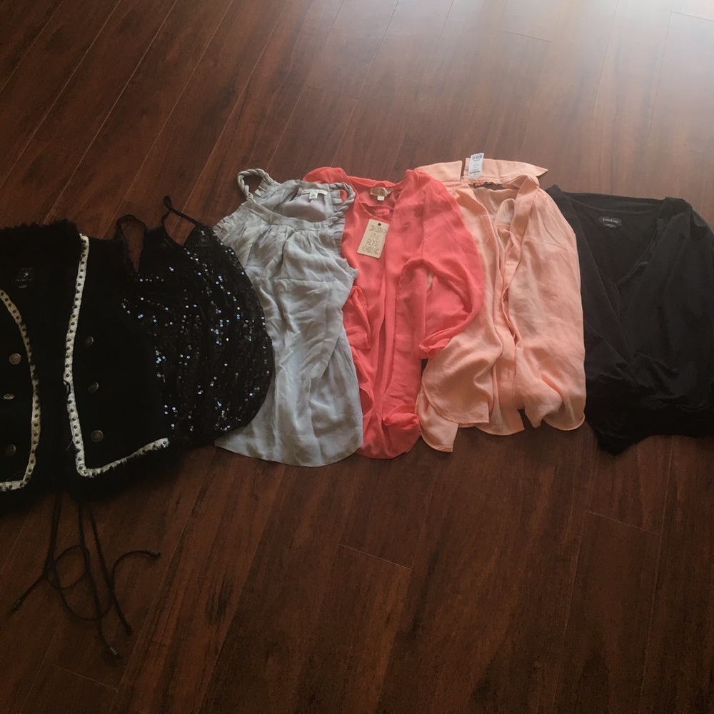 Size small top bundle. Two have tags on.