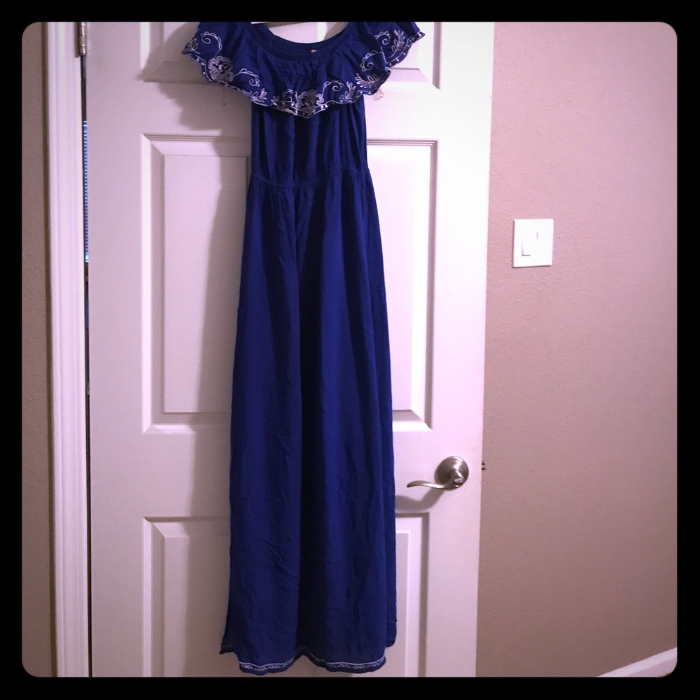 Blue off shoulder dress.