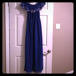 Blue off shoulder dress.