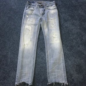 Light wash destroyed/repaired AE jeans