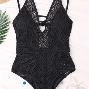 Brand new black one piece bathing suit