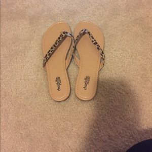 Leopard print flip flops