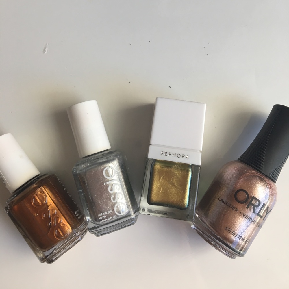 Four metallic nail polishes