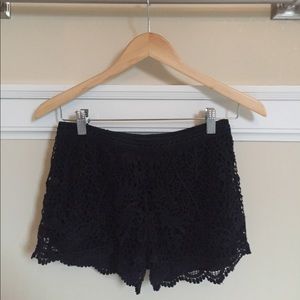 Lace-patterned knit shorts