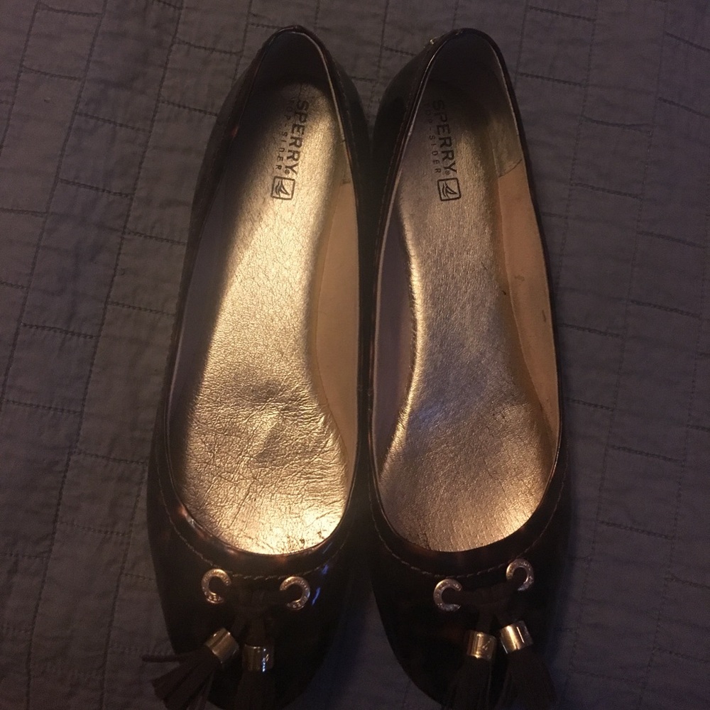 Sperry tortoise shell flats with tassel detail
