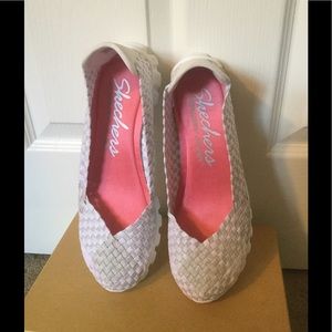 Multi color Skechers slip ons