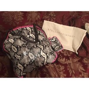 Stella McCarthy Falabella snake skin tote.